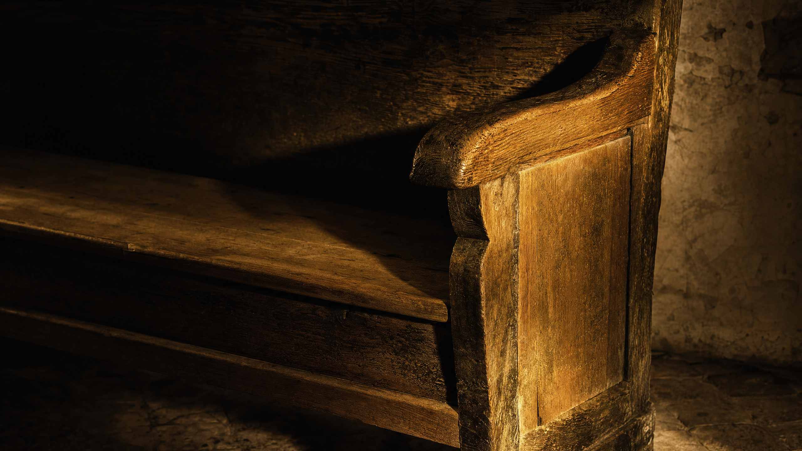 A worn wooden bench photographed in cinematic light, evoking weight, foundation, and continuity. Visual metaphor for the Iacocca Standard as a load-bearing structure.